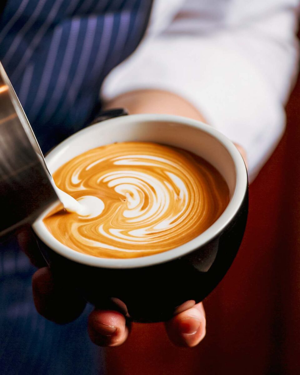 Making latte art at Coffee Bullet, a specialty coffee roastery and cafe in Kaohsiung, Taiwan
