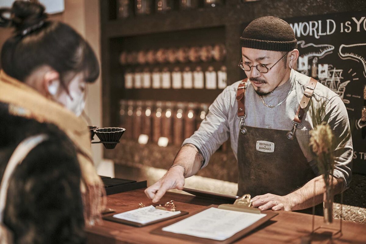 Kazuo Yoshida serving customer at Life Size Cribe, a specialty coffee roastery and cafe in Kokubunji, Tokyo